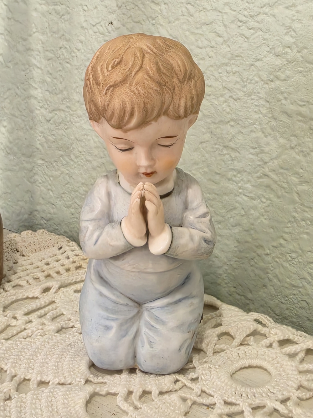 Kneeling Praying Boy Figurine in Soft Pastel Colors